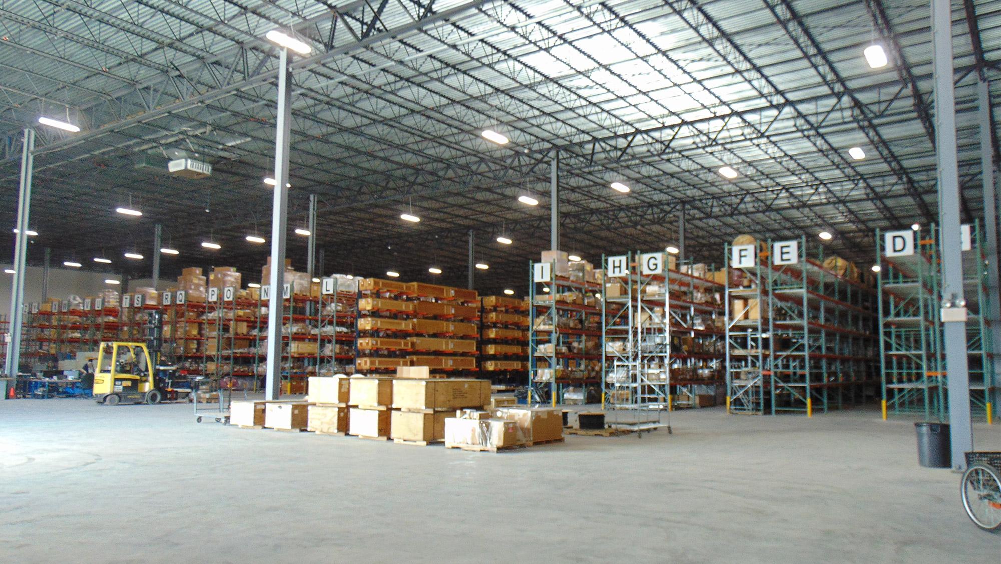 Warehouse facility with rows of boxes on shelves