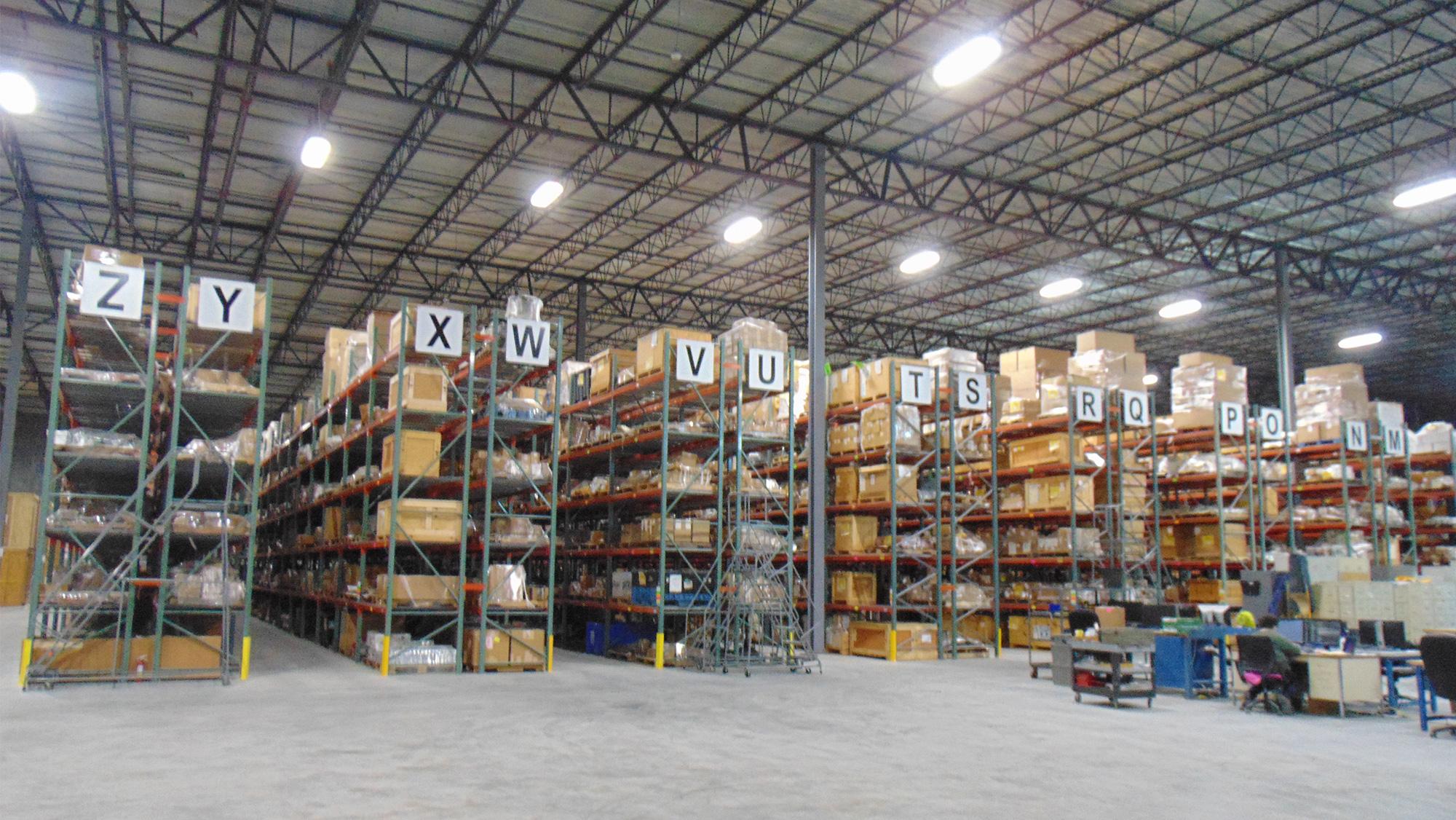Warehouse facility with rows of boxes on shelves